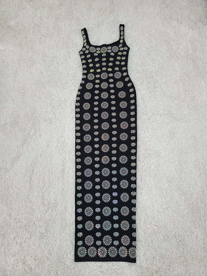 Noir Crystal Gown Noir Crystal Gown featuring a floral pattern on a sleek black background.
