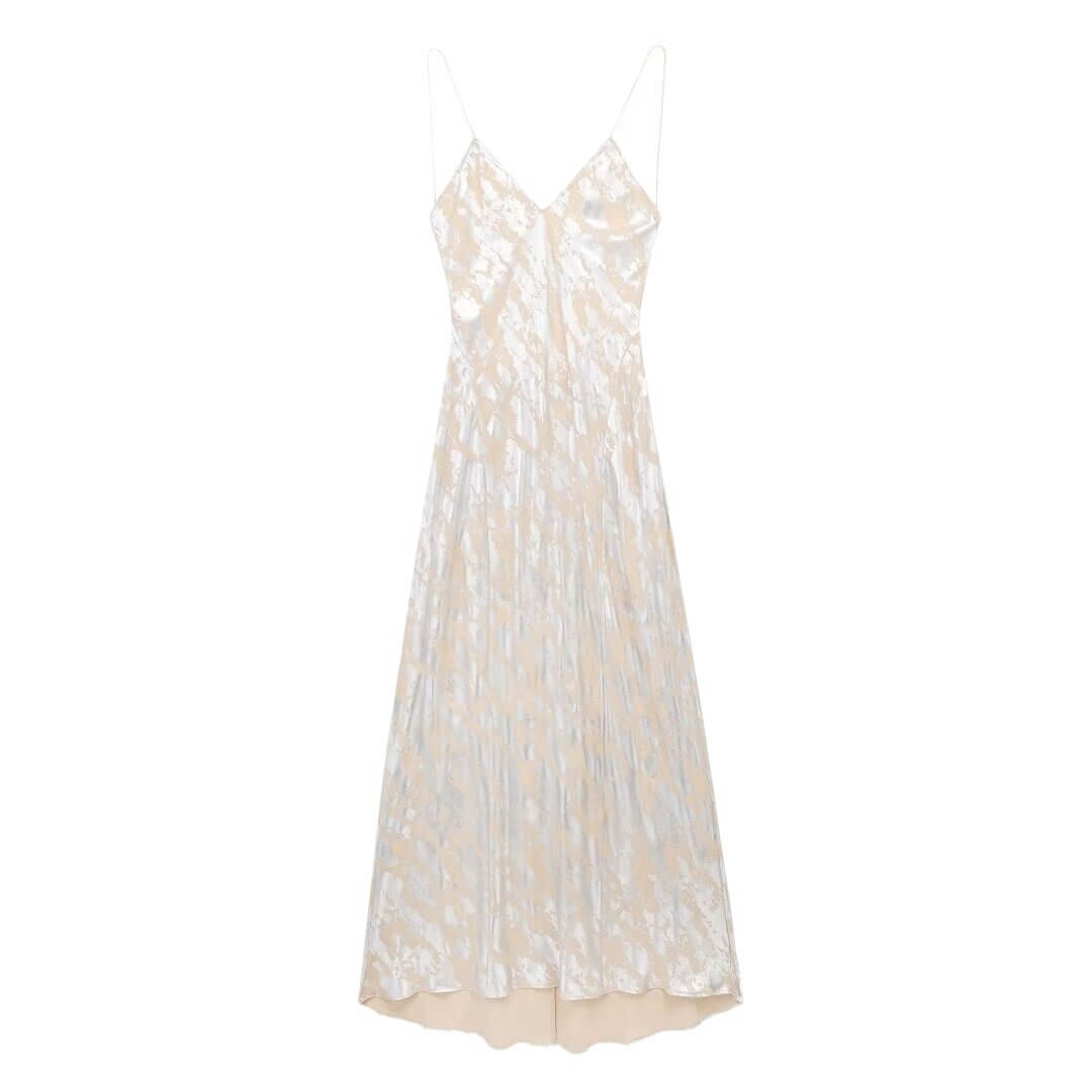 Foil Luxe Dress Foil Luxe Dress in a long, sleeveless, high-waisted design with a unique printing pattern.