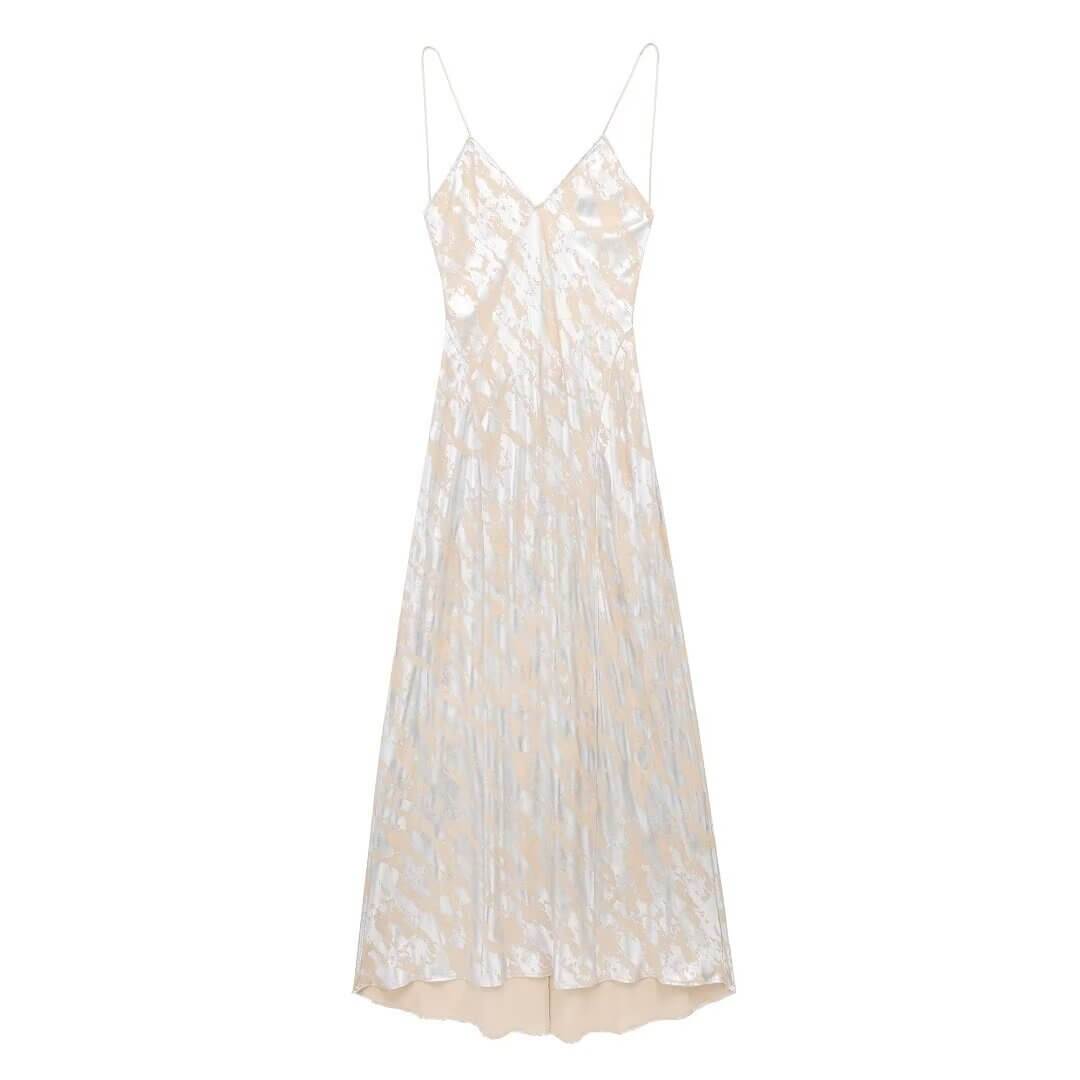 Foil Luxe Dress Foil Luxe Dress in light pastel color with high-waisted long skirt and sleeveless design.