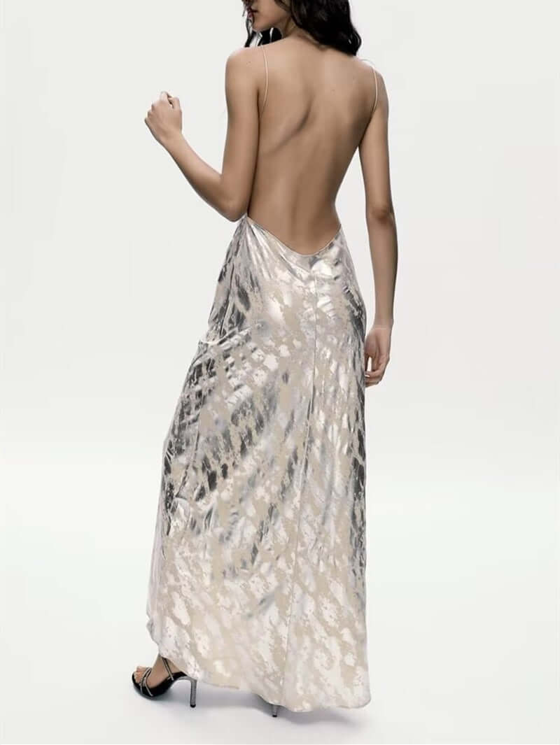 Foil Luxe Dress Foil Luxe Dress featuring a high-waisted, sleeveless design in a long, blended fabric.