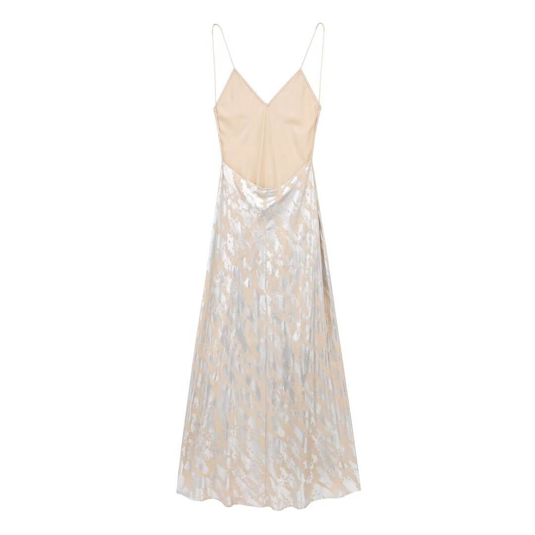 Foil Luxe Dress Foil Luxe Dress in a long, sleeveless design with a high-waisted skirt and blended fabric.